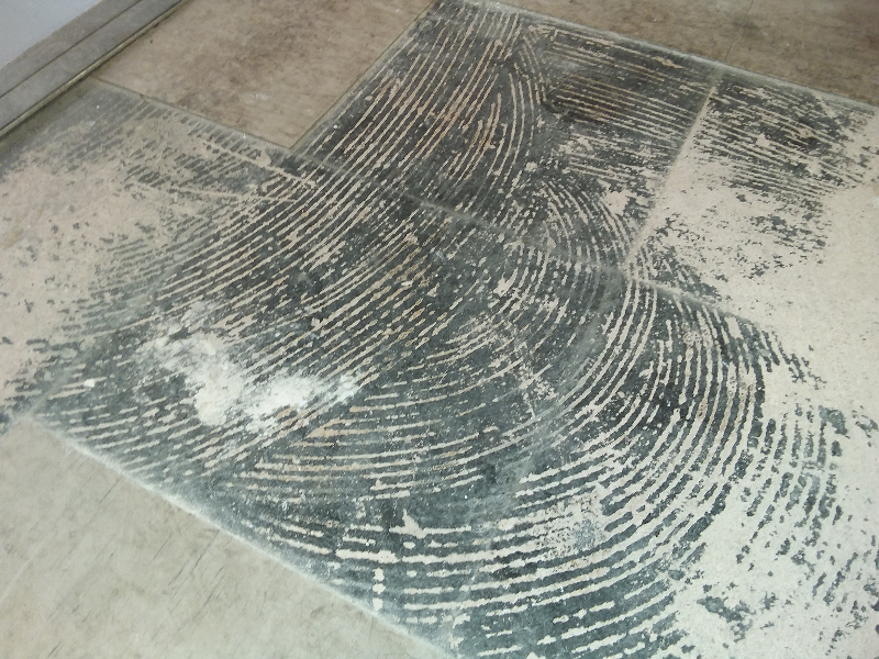 Floor tiles and bitumen adhesive