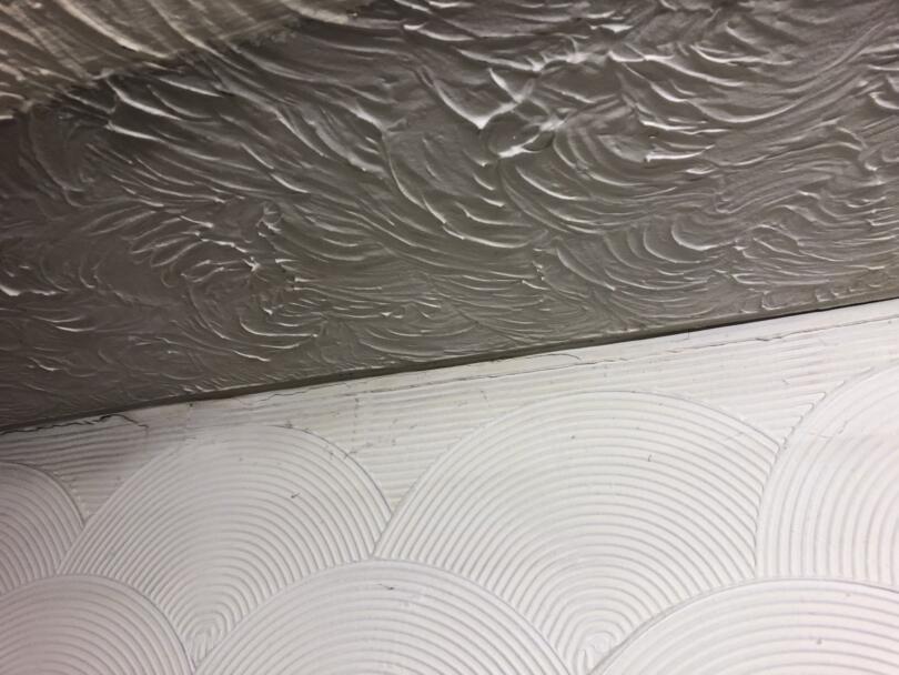 Different asbestos textured coating (artex) patterns on walls and ceiling
