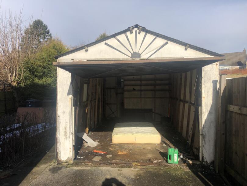 Asbestos garage roof and walls on domestic garage