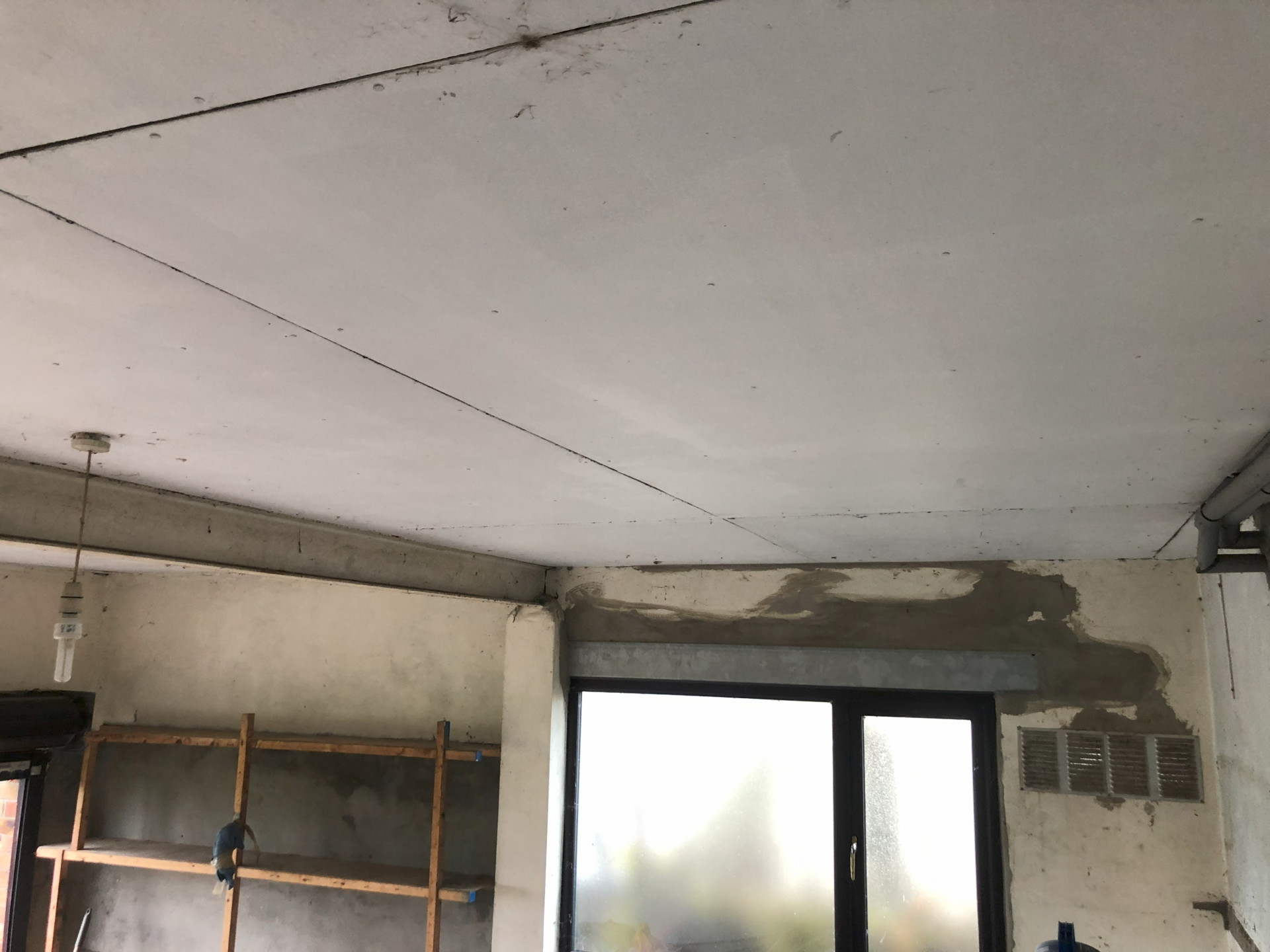 Asbestos cement ceiling panels in garage