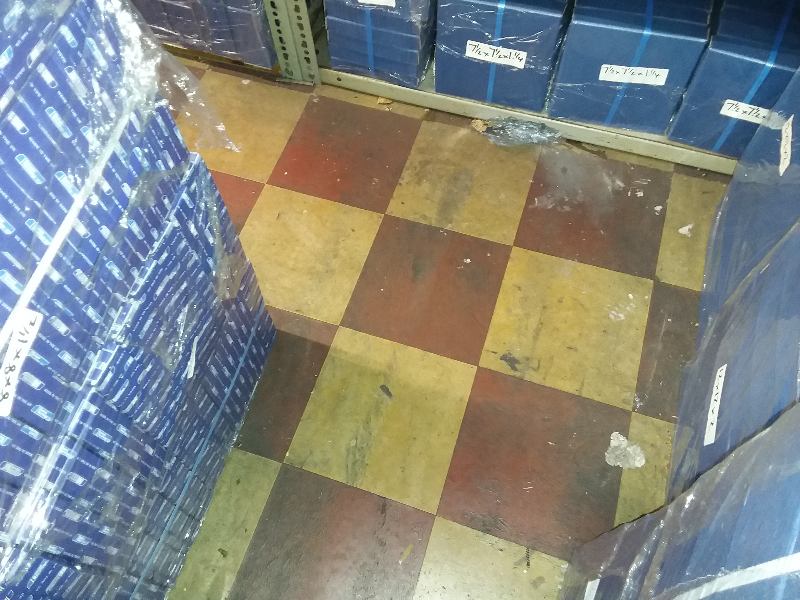 Red and yellow patterned asbestos floor tiles